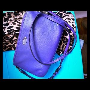Purple coach crossbody adventure bag